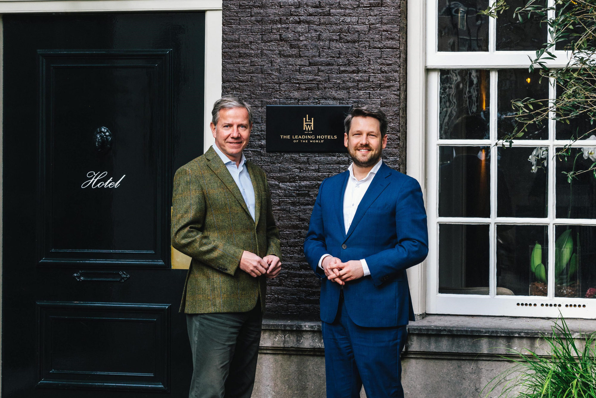 General Manager Rene Bornmann and Director of Sales & Marketing Robbert van Rijsbergen in front of The Dylan Amsterdam, a Leading Hotel of the World