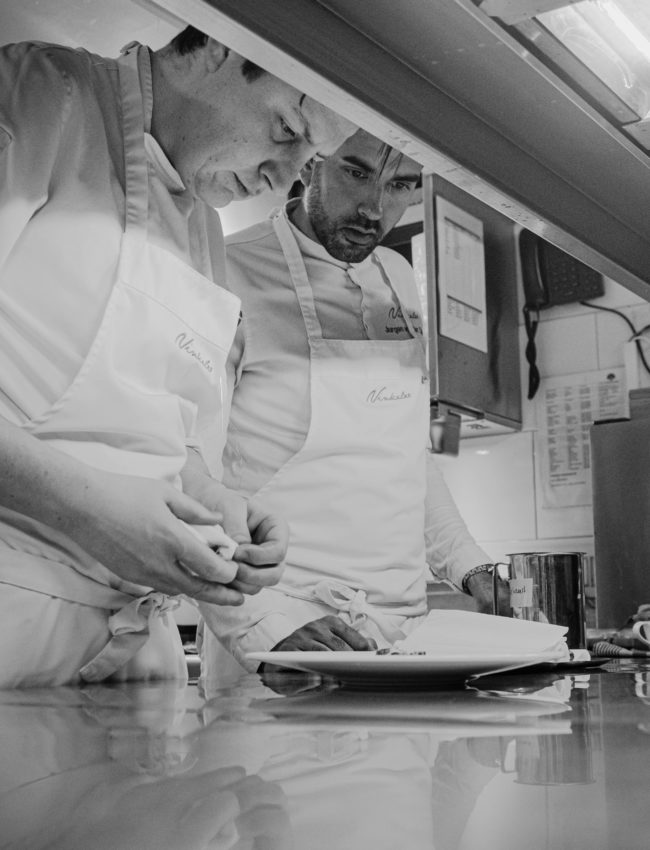 kitchen team Restaurant Vinkeles Chefs of The Dylan Amsterdam making a dish
