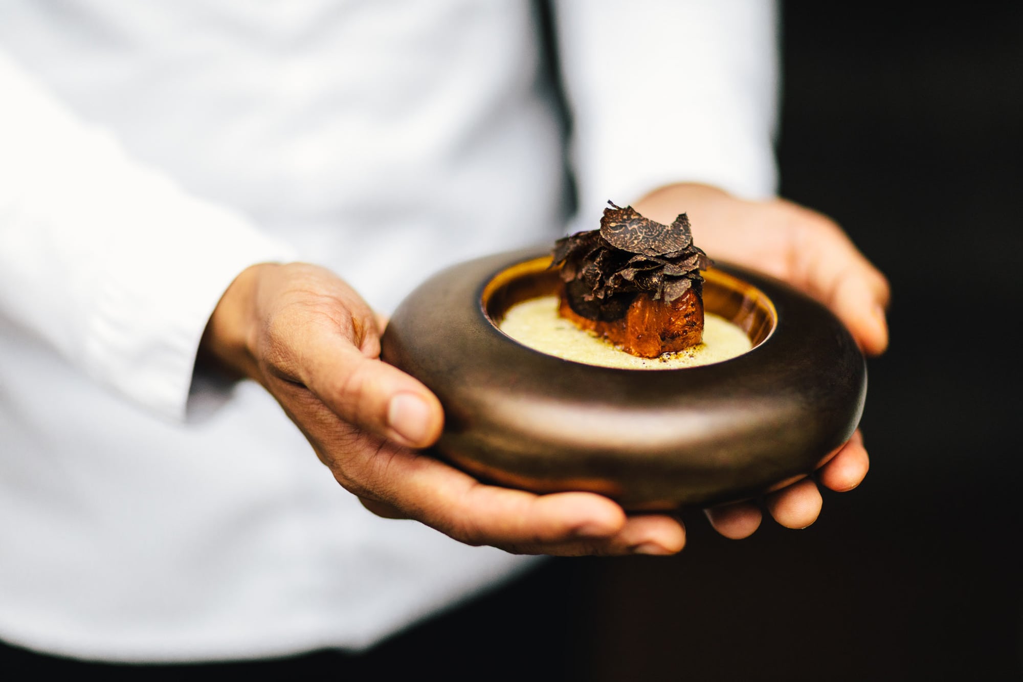 Jurgen van der Zalm of Restaurant Vinkeles presenting his Truffle dish.