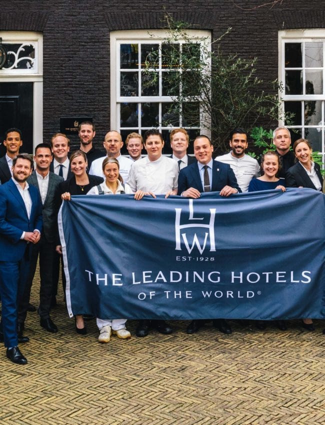Team of The Dylan Amsterdam celebrating being a memeber of The Leading Hotels of the World.