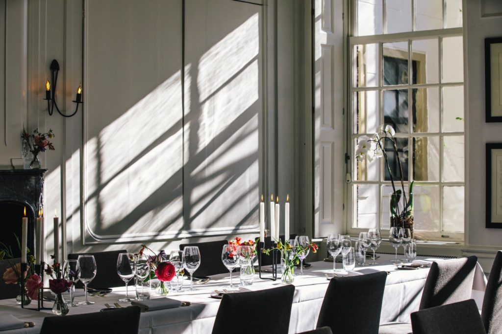 Table set in the Regents room at Luxury boutiqeu hotel The Dylan Amsterdam.