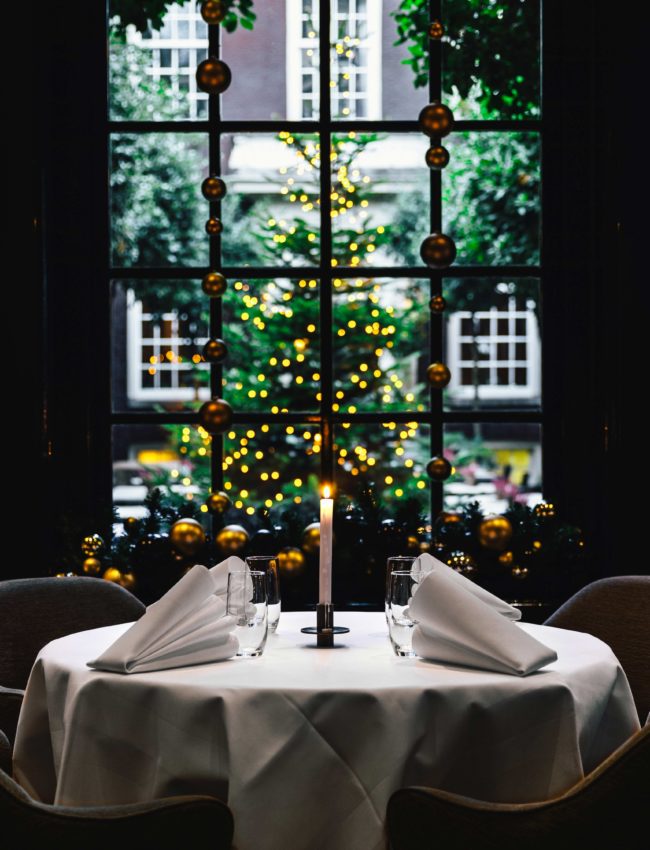 A table during CHristmas in 2 Michelin star restaurant Vinkeles, in luxury boutique hotel The Dylan Amsterdam