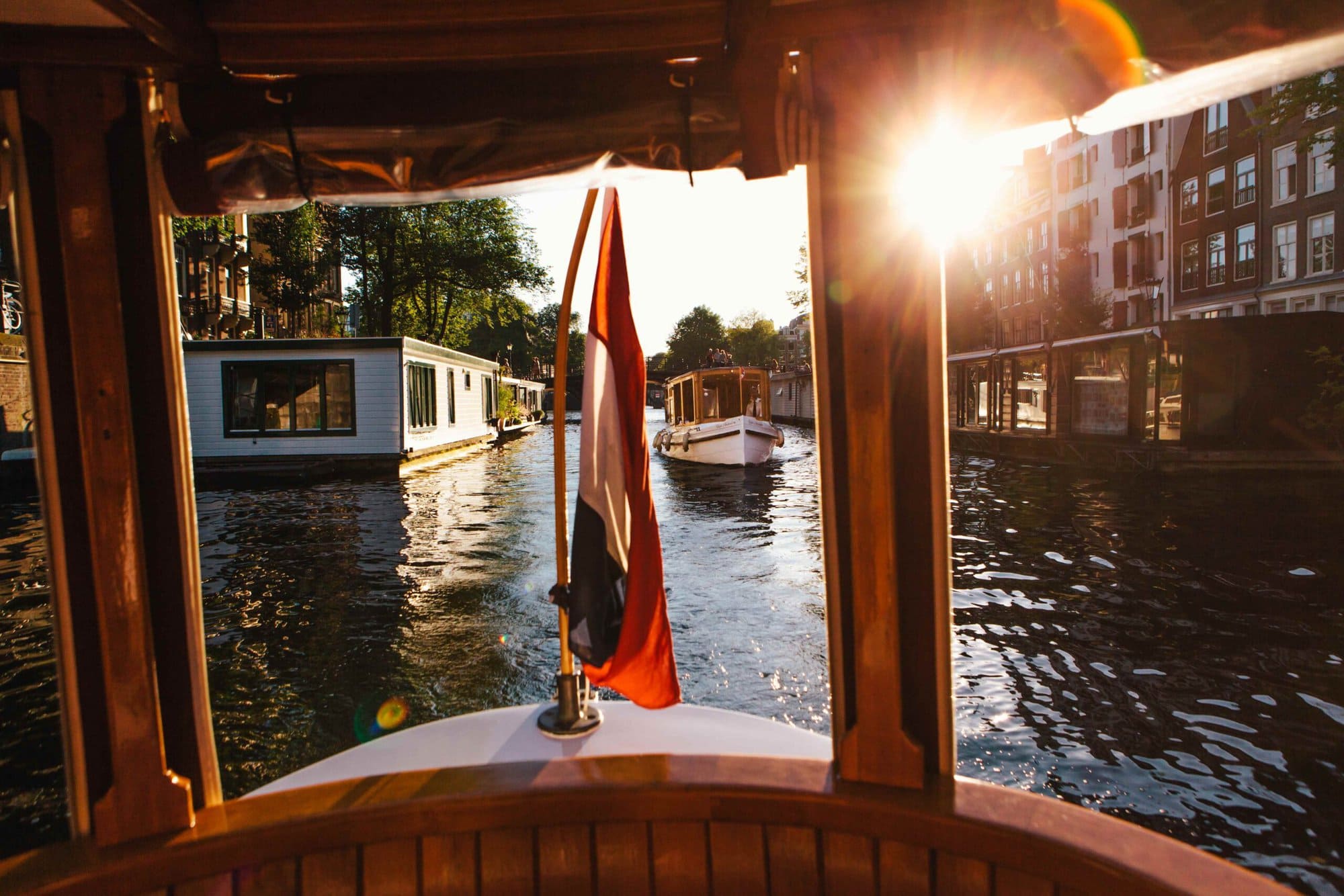 The view from the boat, de Muze, at the canal of Amsterdam. The boat is owned and possible to rent by The Dylan Amsterdam, leading hotels of the world.