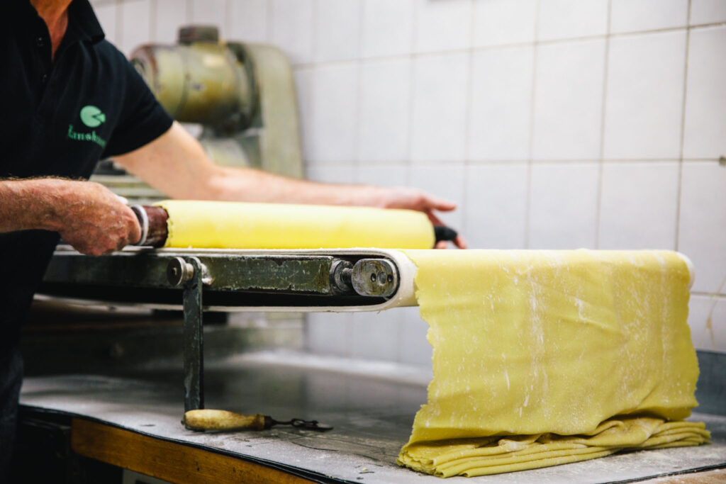Rolling out the dough at Lanskroon bakery in Amsterdam, for their famous caramel waffle, shot for luxury boutique hotel The Dylan