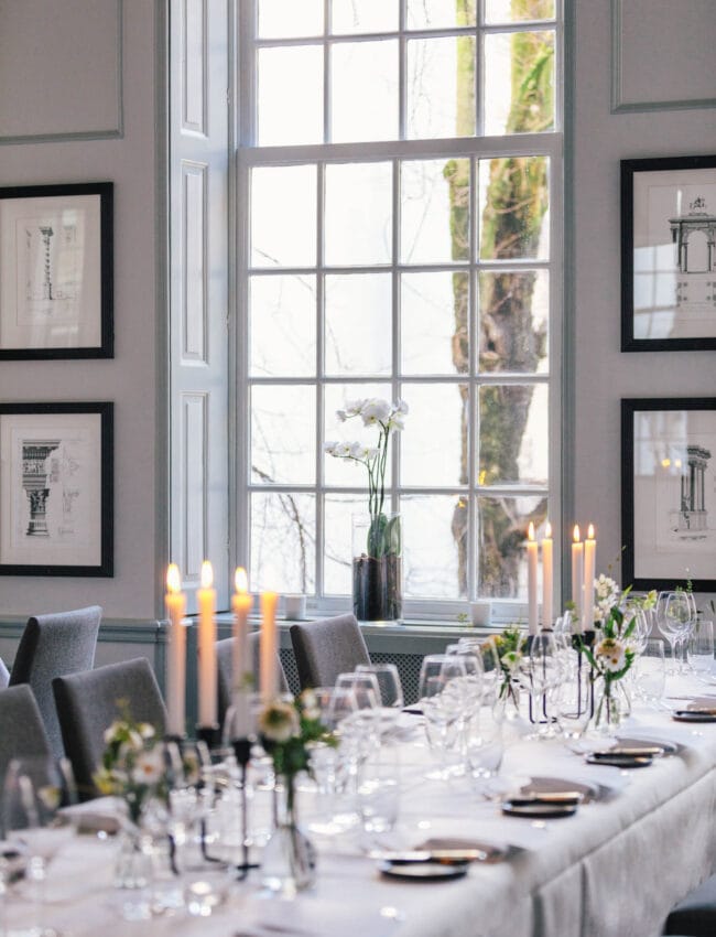 Dinning table set-up for a private dining event in the Regents venue at The Dylan Amsterdam, boutique hotel and part of The Leading Hotels of The World